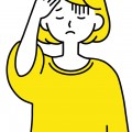 頭痛　黄色　女性